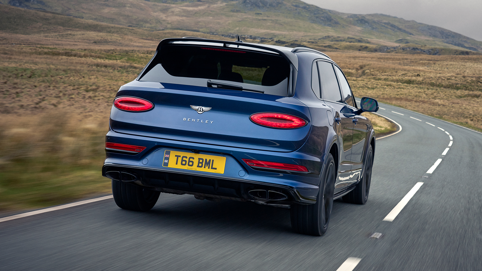 Bentley Bentayga EWB, rear 3/4, driving